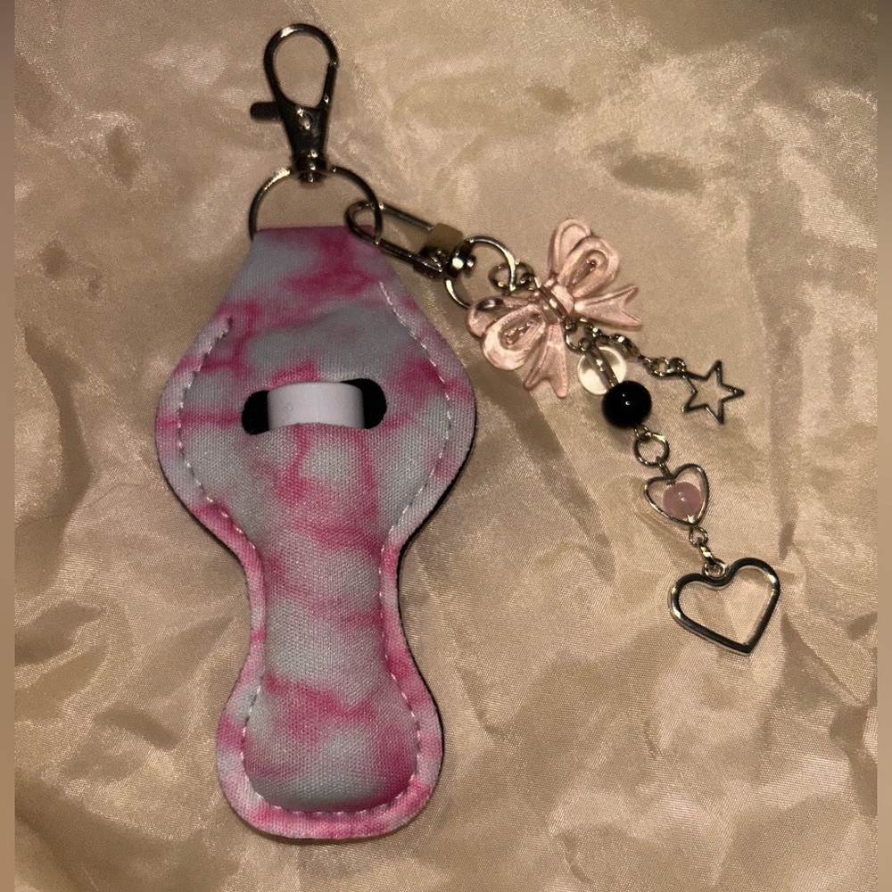 Pink and White Keychain Holder with Charms and chapstick